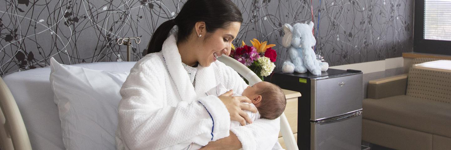 mother and baby in hospital bed