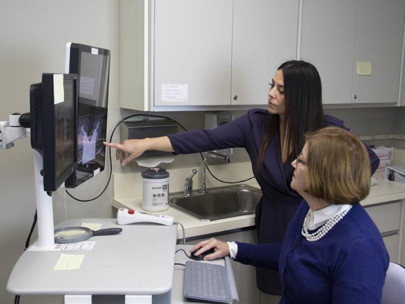 women looking at monitor