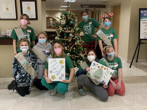 Girl Scouts by the tree