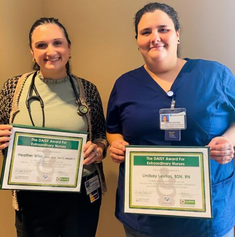 Heather and Lindsay pose with their awards