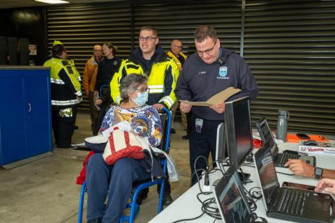 A patient leaving during an evacuation drill.